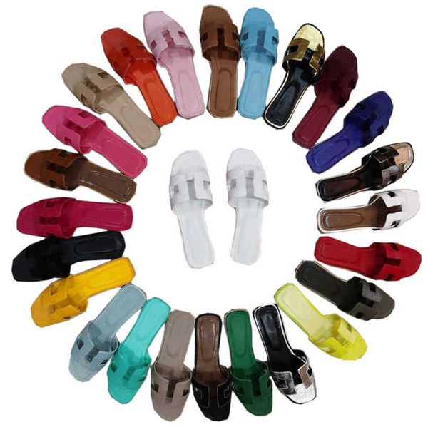 

oran sandal designer slippers for women summer celebrities wearing oran sandals on flat beach leather colors black white blue brown orange