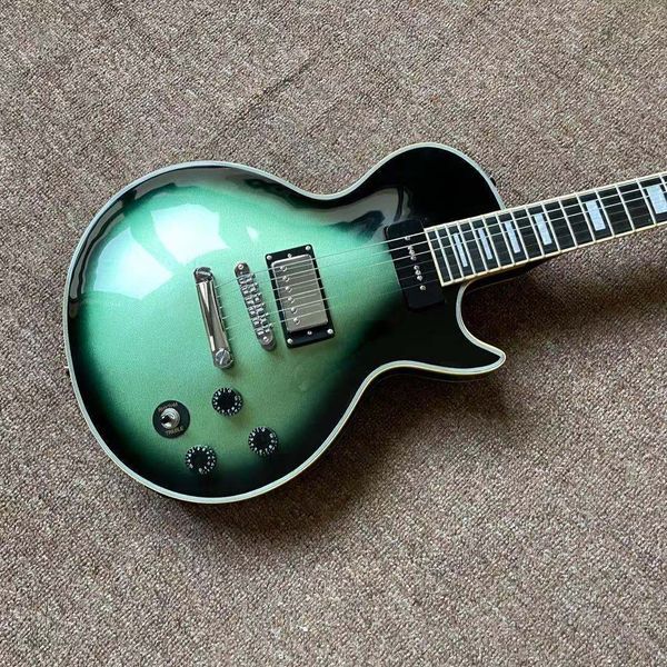 

factory electric guitar ebony fingerboard wrapped with silk peach heart body