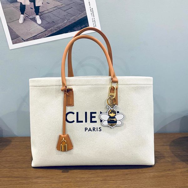 

high capacity luxury triomphe canvas bag linen shoulder clutch travel designer raffias bag woman mens tote white handbag cross body lock bea