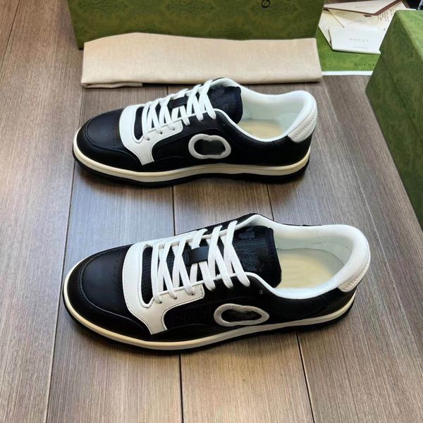 

casual shoes designer men women shoe sneaker mac80 presented against black teather the motif brings house to fore in this retro-inspired des