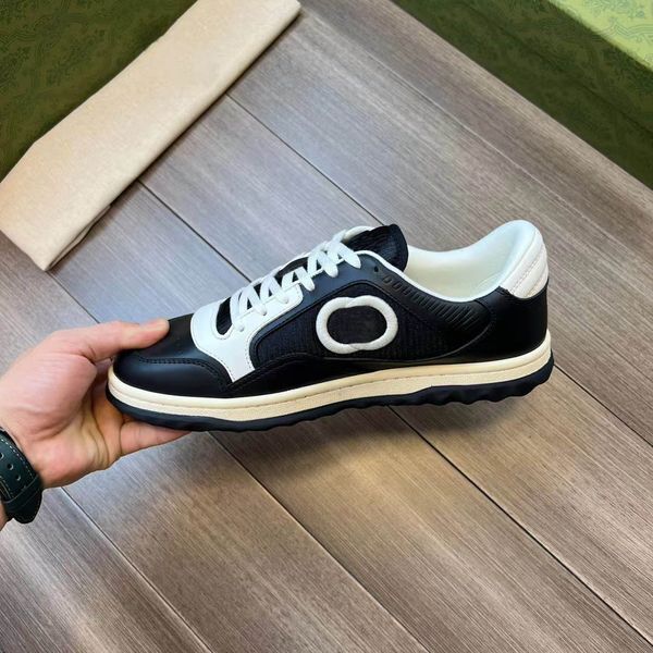 

casual shoes designer men women shoe sneaker mac80 presented against black teather the motif brings house to fore in this retro-inspired des