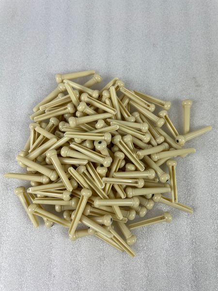 

factory produces 50 pieces of guitar bridge pins abs plastic ivory, yellow with white dots, inlaid with acoustic folk guitar pins accesso