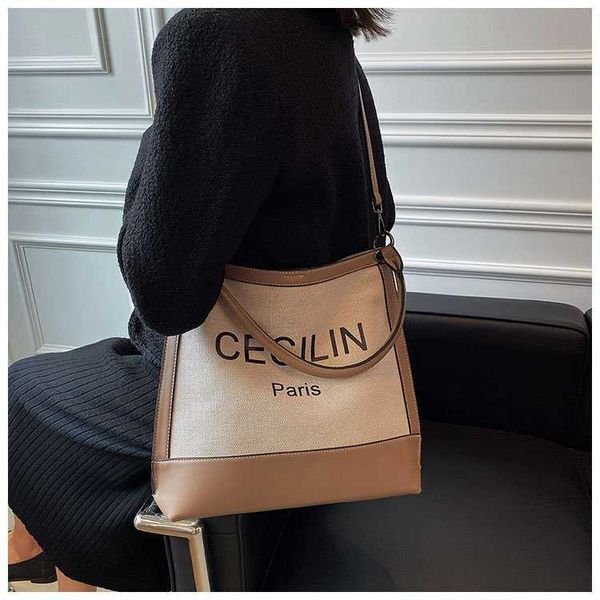 

50% off 2023 handbag tote women's autumn new canvas one shoulder underarm urban minimalist fashion letter hand carrying crossbody bag