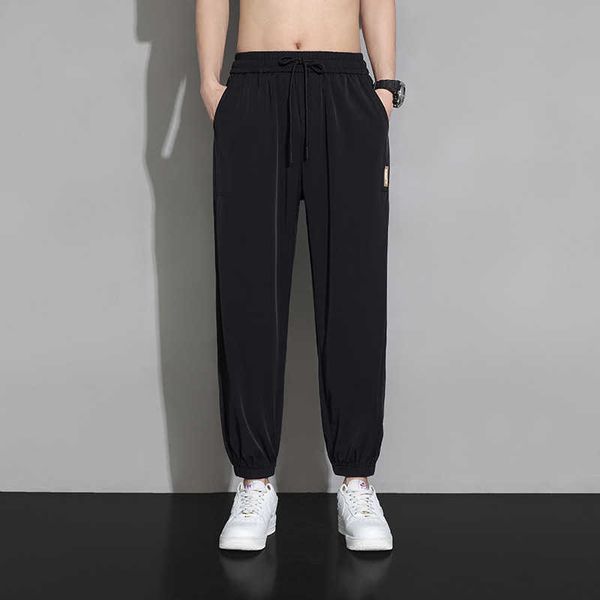 

casual work suit ice pants silk men's tied feet crop pants men's fashion brand summer thin loose large sports pants xn69, Black