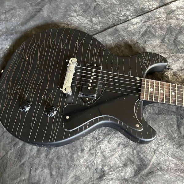 

black old imitation electric guitar peach heart body neck rosewood fingerboard