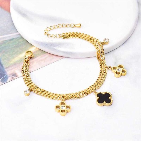 

exaggerated thick bracelet link hollow flower shaped diamond embedded black shell pendant titanium steel color retaining electroplating