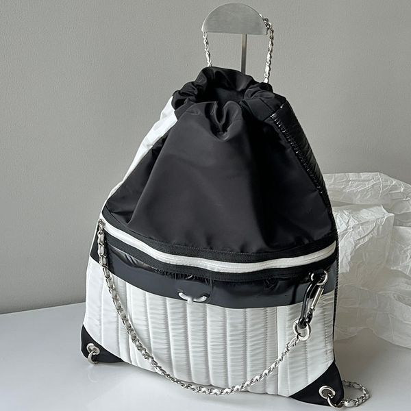 

women designer nylon two-tone jumbo black backpack bag patchwork matelasse chain drawstring high capacity black/white metal hardware soft lu