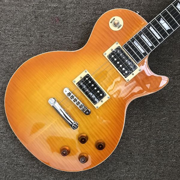 

lp electric guitar, rosewood fingerboard frets binding honey burst maple top