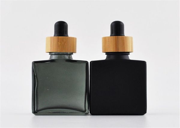 

1oz bamboo lid bottle beard oil 30ml rectangular stamping frosted black glass liquid dropper square with wooden cap4919687