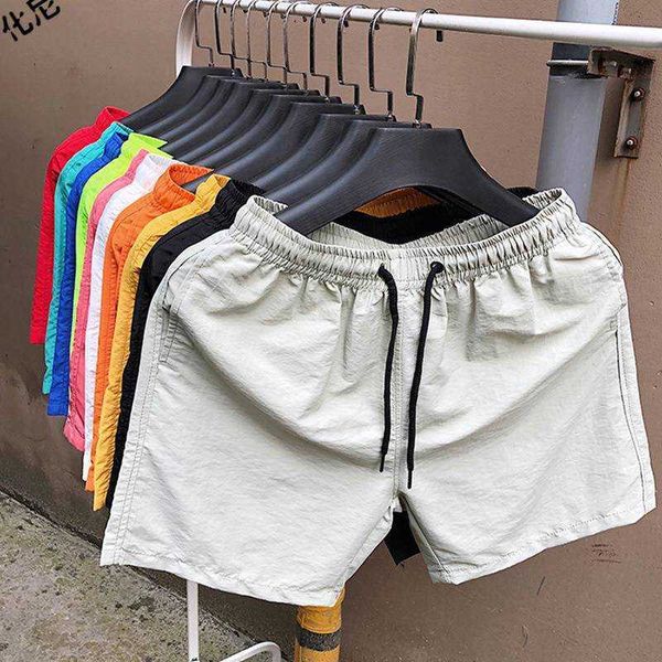 

men's clothing huani summer quick dried beach pants trendy 3/4 casual sports shorts vacation short, White;black