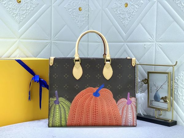

mt onthego pm tote bag yayoi kusama shoulder bag infinity white dots print handbag with pumpkin-shaped charm on the go polka dots m46466