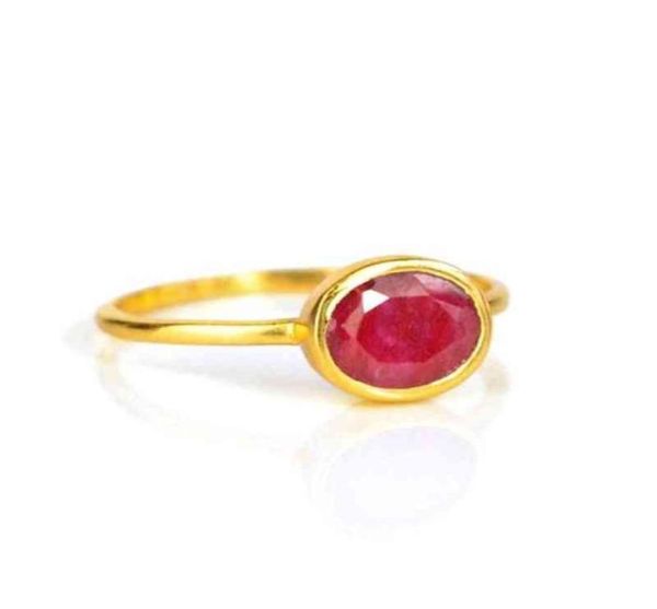 

dyed ruby oval shape bezel set gold vermeil ring0123455785715