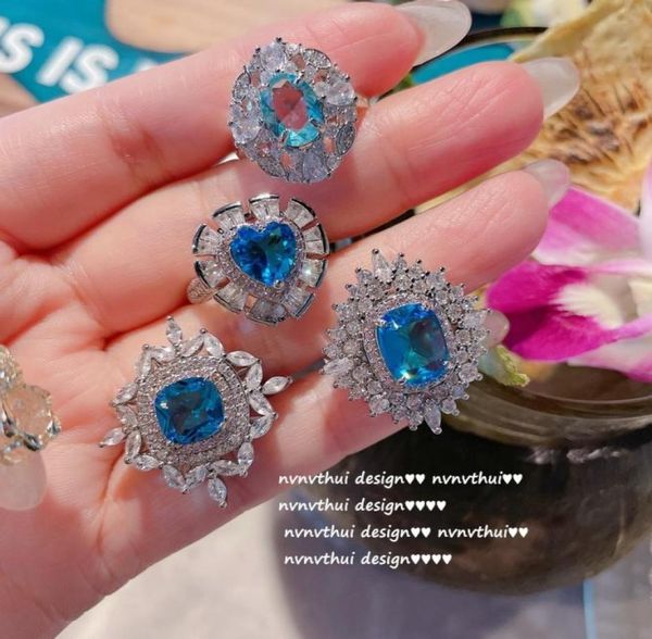 

bright luminous sea blue plated with 18k gold multi cut horse eye shape colorful treasure zircon full diamond open ring1897210