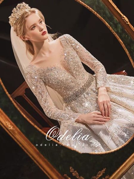 

gorgeous wedding dresses v neck backless crystal beading long sleeves a line with sweep train applique sequined bride gowns new, White
