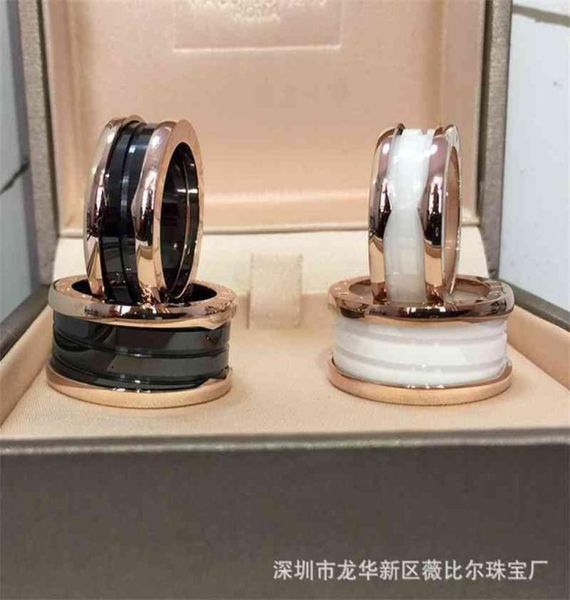 

18k rose gold couple black and white ceramic tail ring0127320580