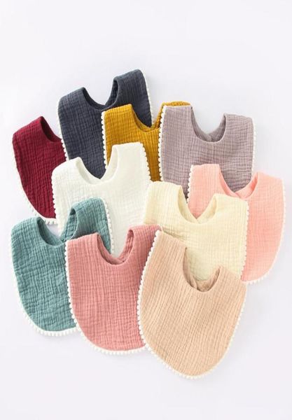 

ins simple baby bibs 100 cotton solid color and tassel design infants baby feeding boy bib 12 colors with button4851725