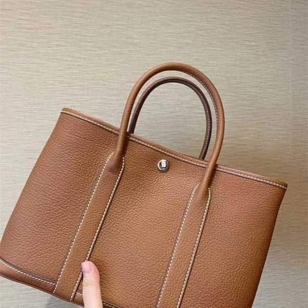 

authentic handbag designer garden party tote bag handmade wax thread bag togo cowhide business handbag commuter women's bag tote bag
