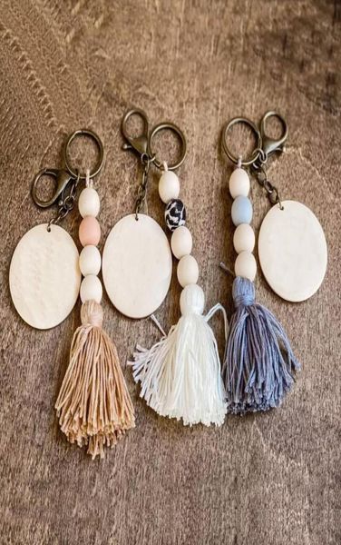 

custom cotton tassel silicone bead key ring whole carved wood disc boho straight keychain5603006, Silver