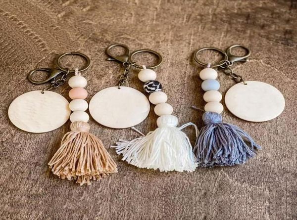 

custom cotton tassel silicone bead key ring whole carved wood disc boho straight keychain8999223, Silver
