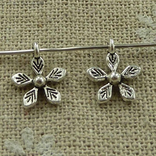 

other 900 pieces tibetan silver flower charms 12x10mm #3526