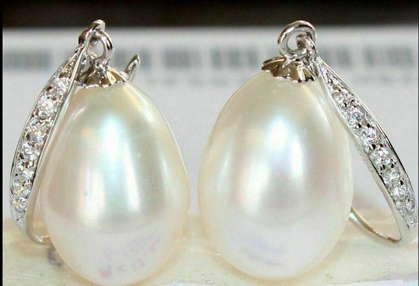 

knot a pair of natural aaa 1112mm south seas white pearl earrings, Silver