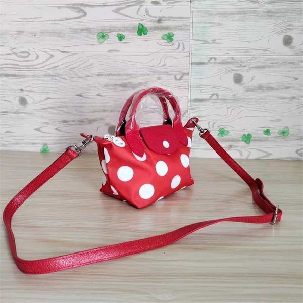 

red and product luxury wallets beach bag handheld crossbody dumpling 2023 leather with white nylon dotted mini s designer women
