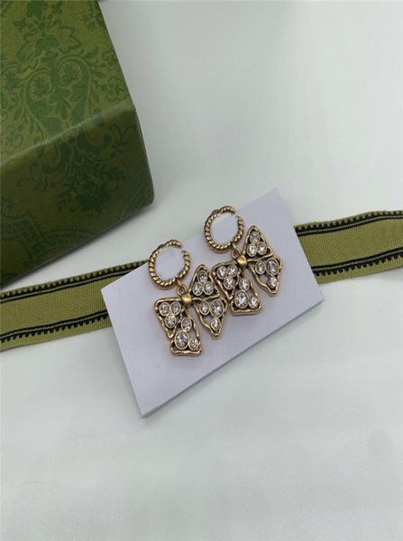 

chic bow diamond charm earrings rhinestone double letter designer eardrops with stamps women pendant studs gift box3661539, Golden