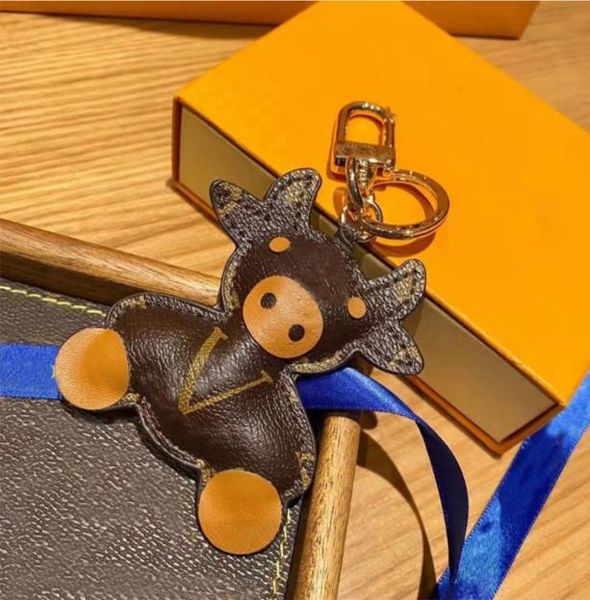 

classic pattern leather key ring cute cartoon cow coin purse keychains fashion mobile phone bag wristlet keychains3125989, Slivery;golden