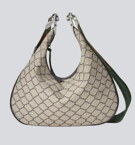 

attache large shoulder bag beige blue canvas crescent moon g shaped hook closure ebony blue red web trim additional leather strap 8689268