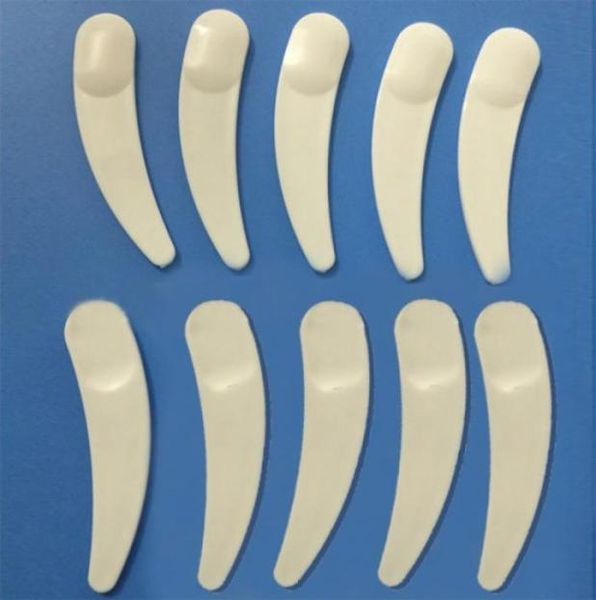 

whole200pcs new mini cosmetic spatula scoop disposable mask white plastic spoon makeup maquillage tools5139287