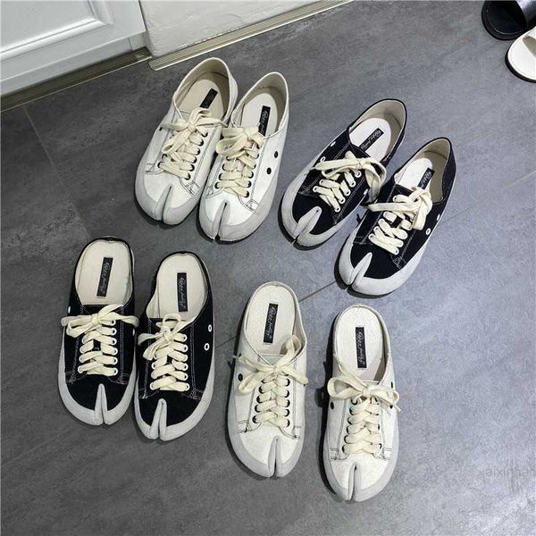 

2022 autumn korean version new network red split toe pig shoes women's flat bottom versatile sheep feet casual lace up canvas shoe tren