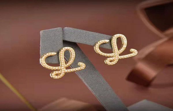 

retro gold stud designer earrings for women inspireds womans girls trendy jewelry earring geometry hollow ruyi knot fashion access1213299, Golden;silver