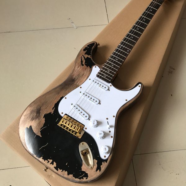 

antique black electric guitar, mahogany fingerboard, gold hardware, 58