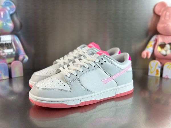 

the women's duks low 520 skateboarder receives grey and pink accents 2023 spring summer lifestyle dnk pack pink white gray designer ath