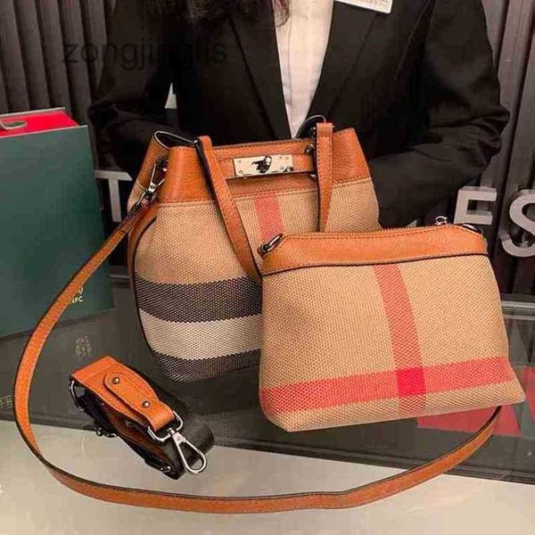 

advanced foreign burbrerys classic sense of ladies style leather bag bucket women's high-end plaid canvas diagonal straddle versatile s