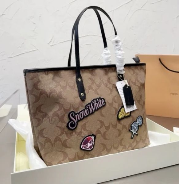 

Top Totes Designers Tote Bag Cbag Classic Designer Bag Leather Luxurys Handbag High Capacity Shopping Bags All Match Womens Street Mummy Handbags Wallet, Pink