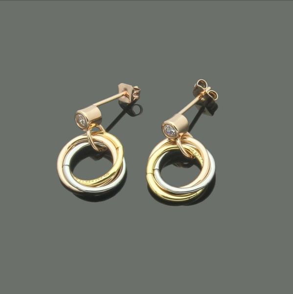 

dangle & chandelier european and american high-quality fashion brand jewelry single diamond hanging three ring intermediate color earrings, Silver