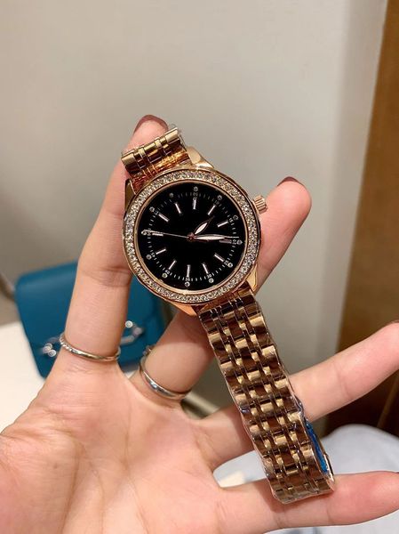 

the new fashionable ladies watch solid steel strap dial 35mmm, Slivery;brown