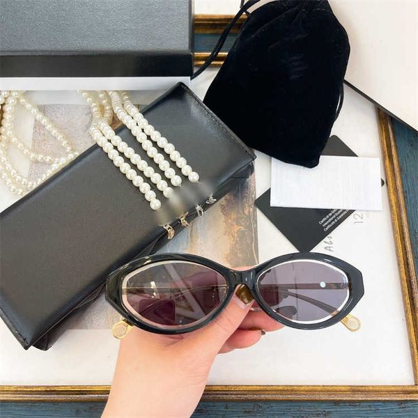 

Fashion designer brand cool sunglasses luxury Super high quality family personality oval cat's Eye Women's net red samayu same pearl chain ch5424 with logo box