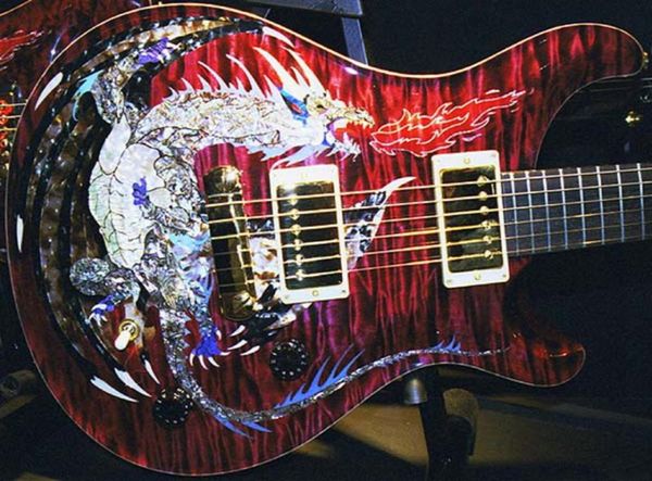 

paul reed dragon 2000 30 red flame maple electric guitar no fretboard inlay wrap arround tailpiece wood body binding gold 7975476