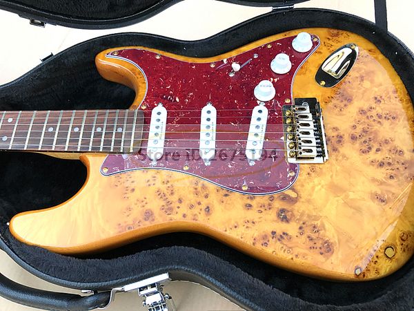 

treeburl electric guitar has a great tone, perfect for the show , ing