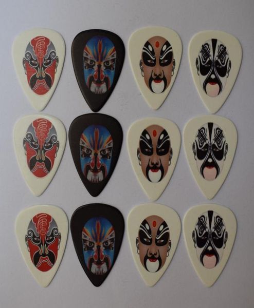 

12pcs 071mm new popular beijing opera masks rock band musical plectrums guitar picks3965393