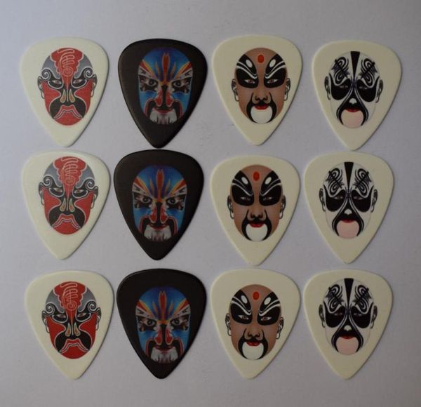

12pcs 071mm new popular beijing opera masks rock band musical plectrums guitar picks2750127