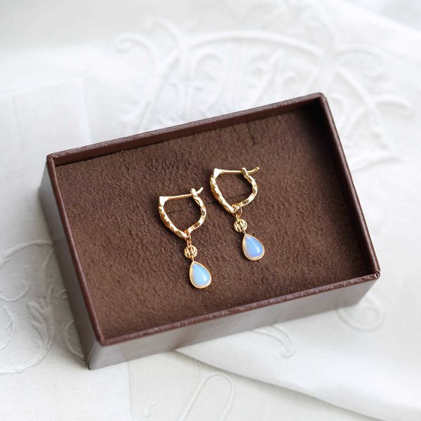 

japanese agent's pure white fungus nail hollow pattern exquisite opal earring earrings, Golden