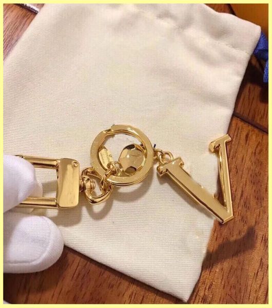 

fashion woman ring mans designer keychains high qualtiy alloy fashionable handmade keychain stylish key buckle bag charm whole6508619, Slivery;golden
