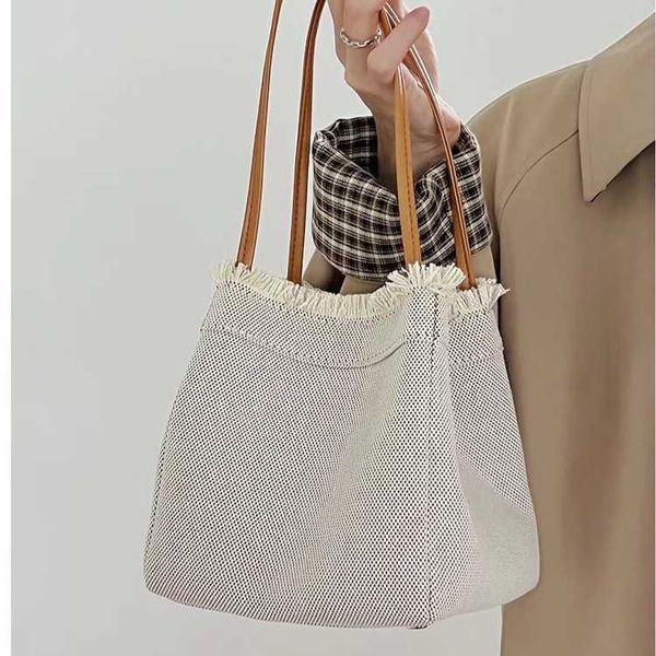 

women's designer bag new niche minimalist large capacity denim canvas portable bucket bag fashionable versatile vegetable basket 230318