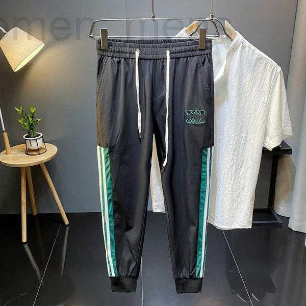 

men's pants designer luxury mens sweatpants pants summer trslim thin slacks men women white striped quick-drying trousers c2wf, Black