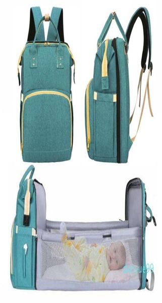 

large mummy maternity diaper bags with folding bed for baby travel outdoor backpack for mom changing nappy stroller handbag6602668