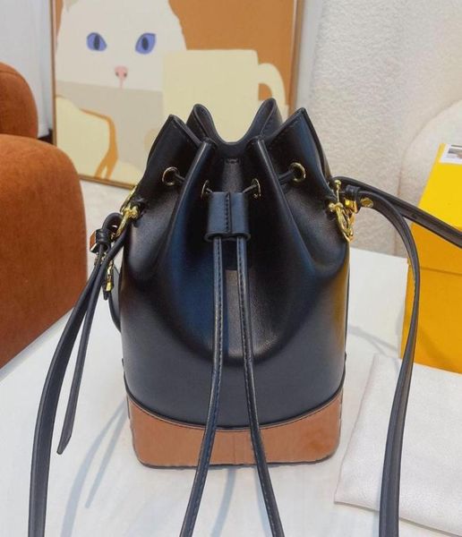 

women039s bucket bag 2f brown leather bucket bag with drawstring and metal with black hand painted raised pattern2159134