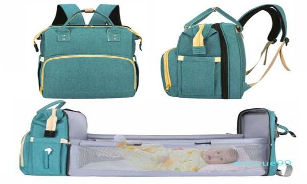 

large mummy maternity diaper bags with folding bed for baby travel outdoor backpack for mom changing nappy stroller handbag3183018